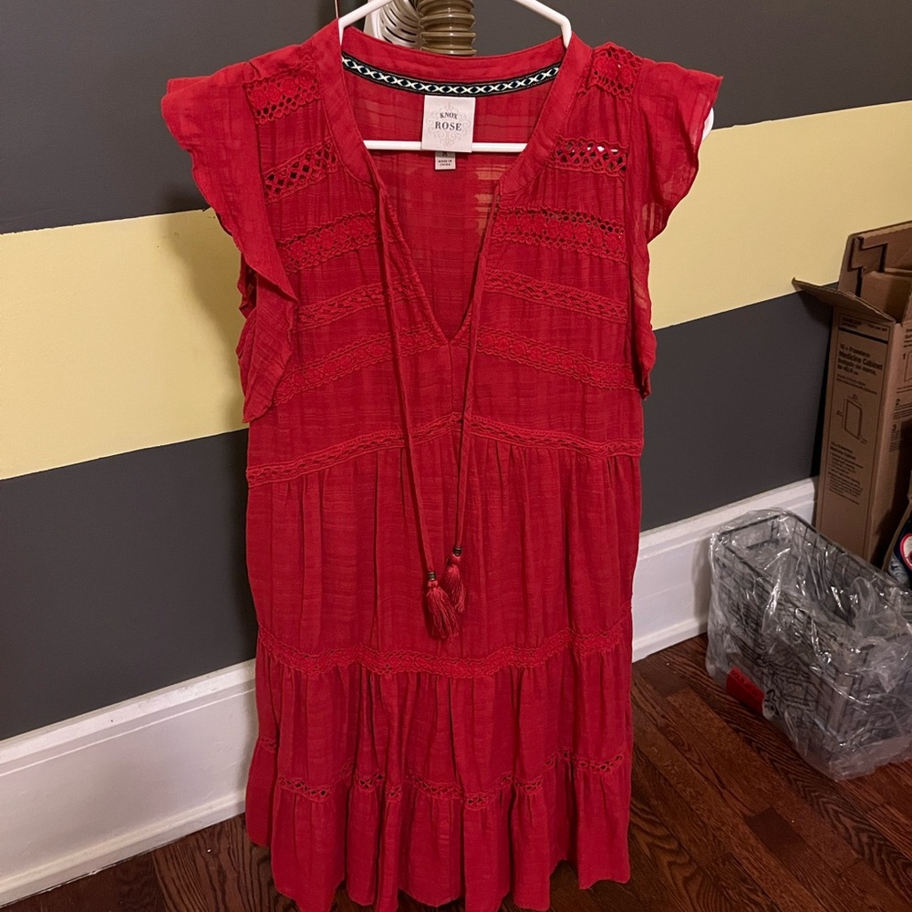 Red dress with lots of detailing